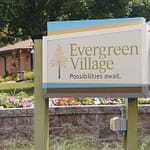 Evergreen Village sign.